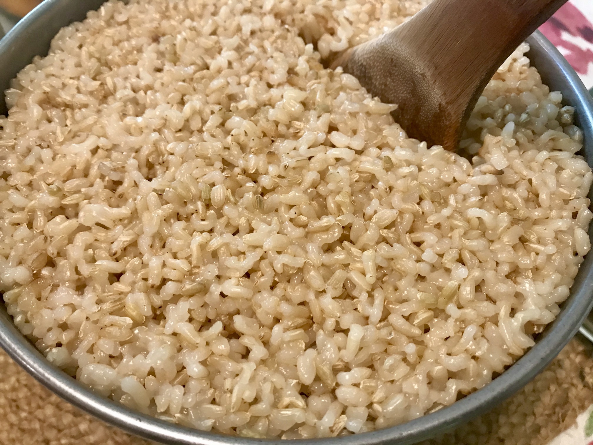 Brown Rice pressure cooked in a stainless steel bowl