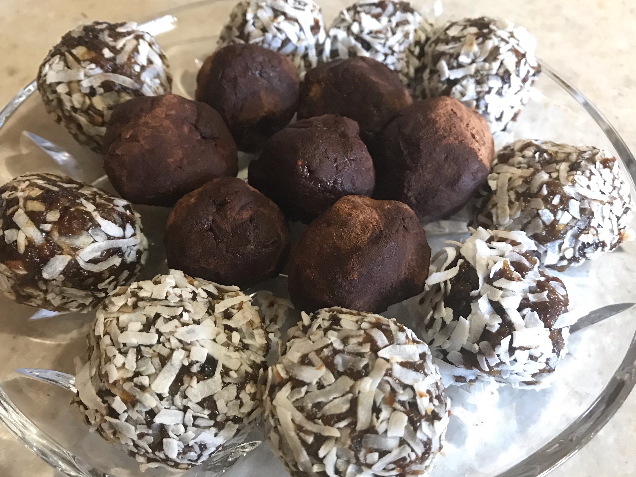 Dried Fruit truffles on crystal plate