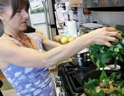 Me cooking greens for mom 2016