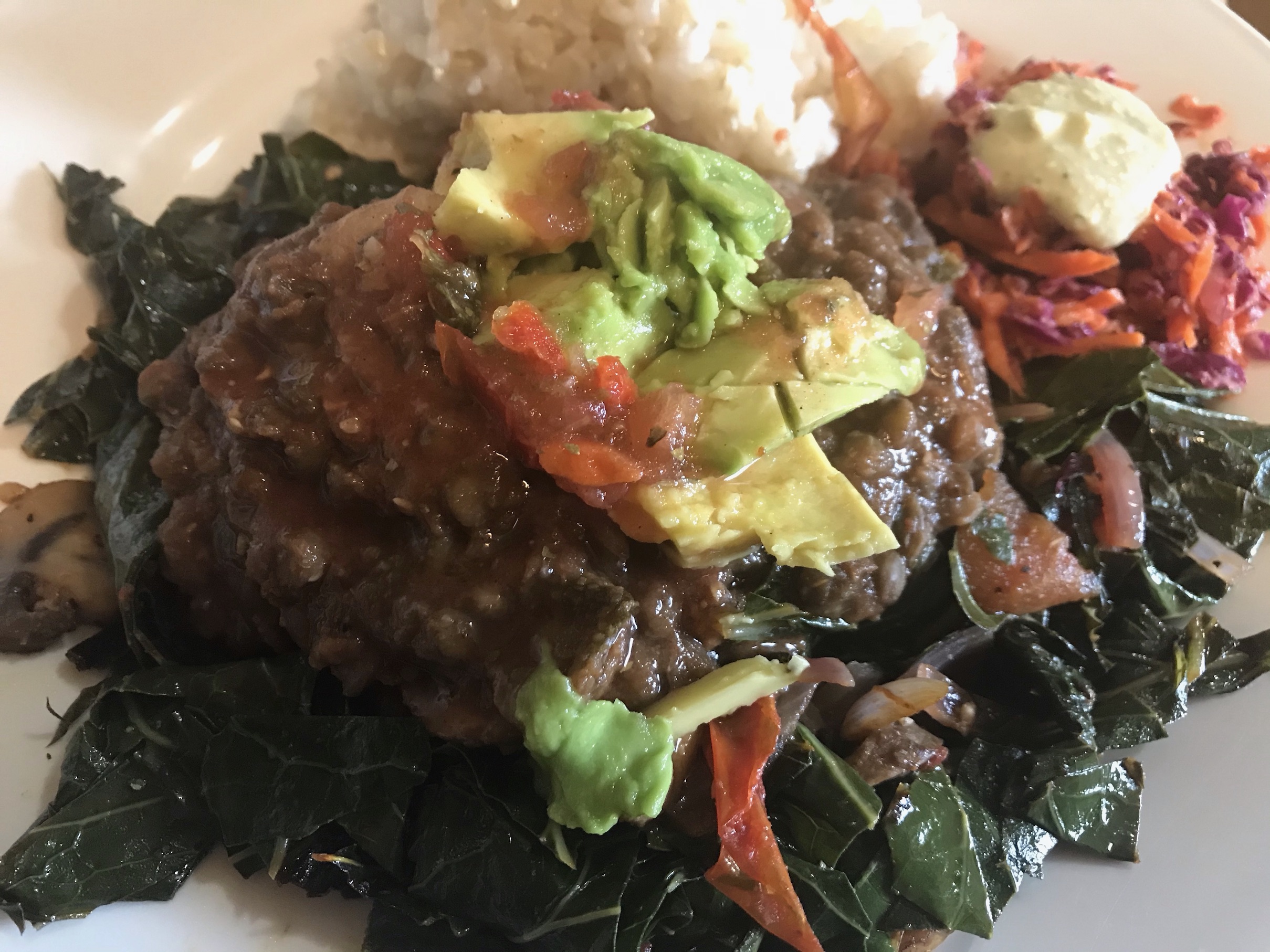 Thick cooked lentils on top of greens and topped with avocado, served with brown rice & Carrot Beet Salad with Cashew Dressing  Thick cooked lentils on top of greens and topped with avocado, served with brown rice & Carrot Beet Salad with Cashew Dressing