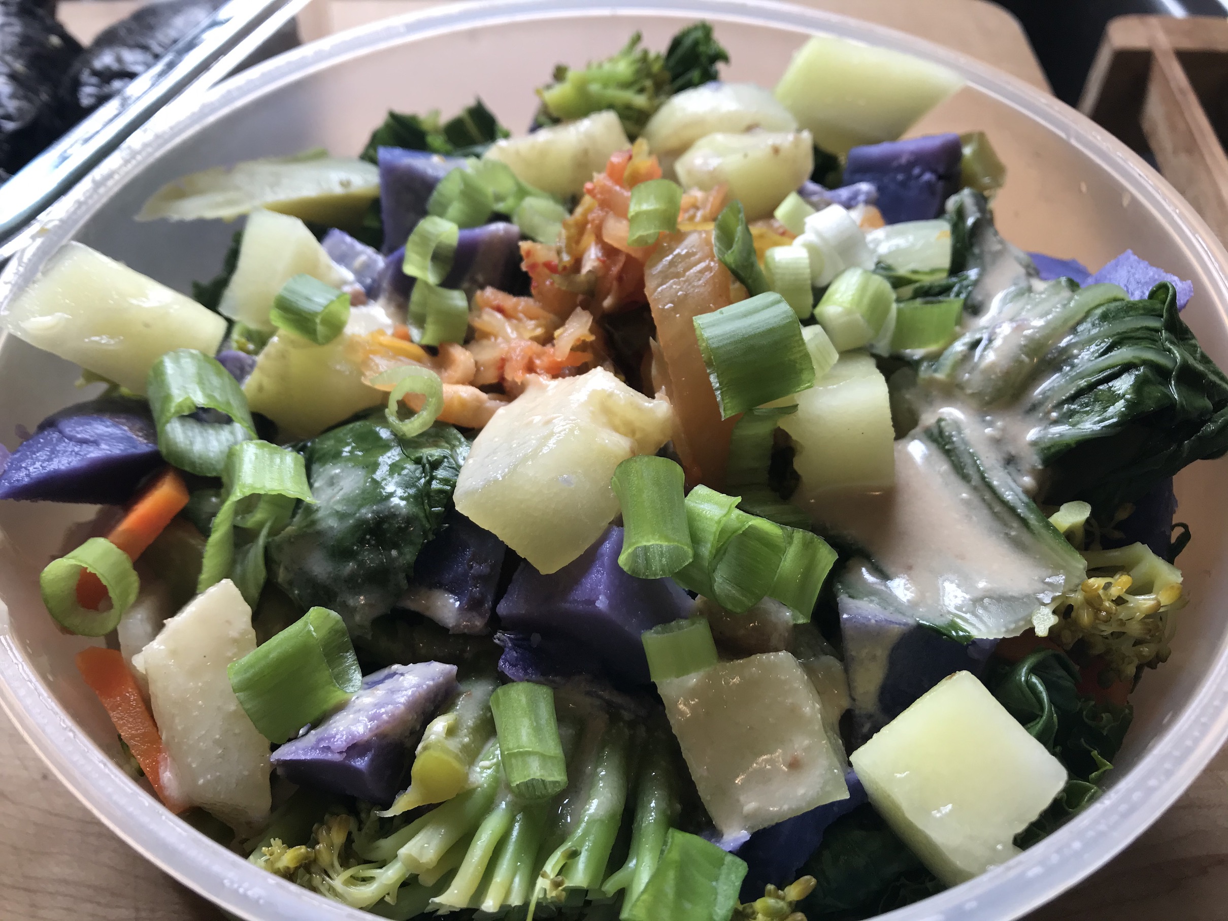 Salad to-go with purple & white potatoes & local seasonal vegetables Salad to-go with purple & white potatoes & local seasonal vegetables