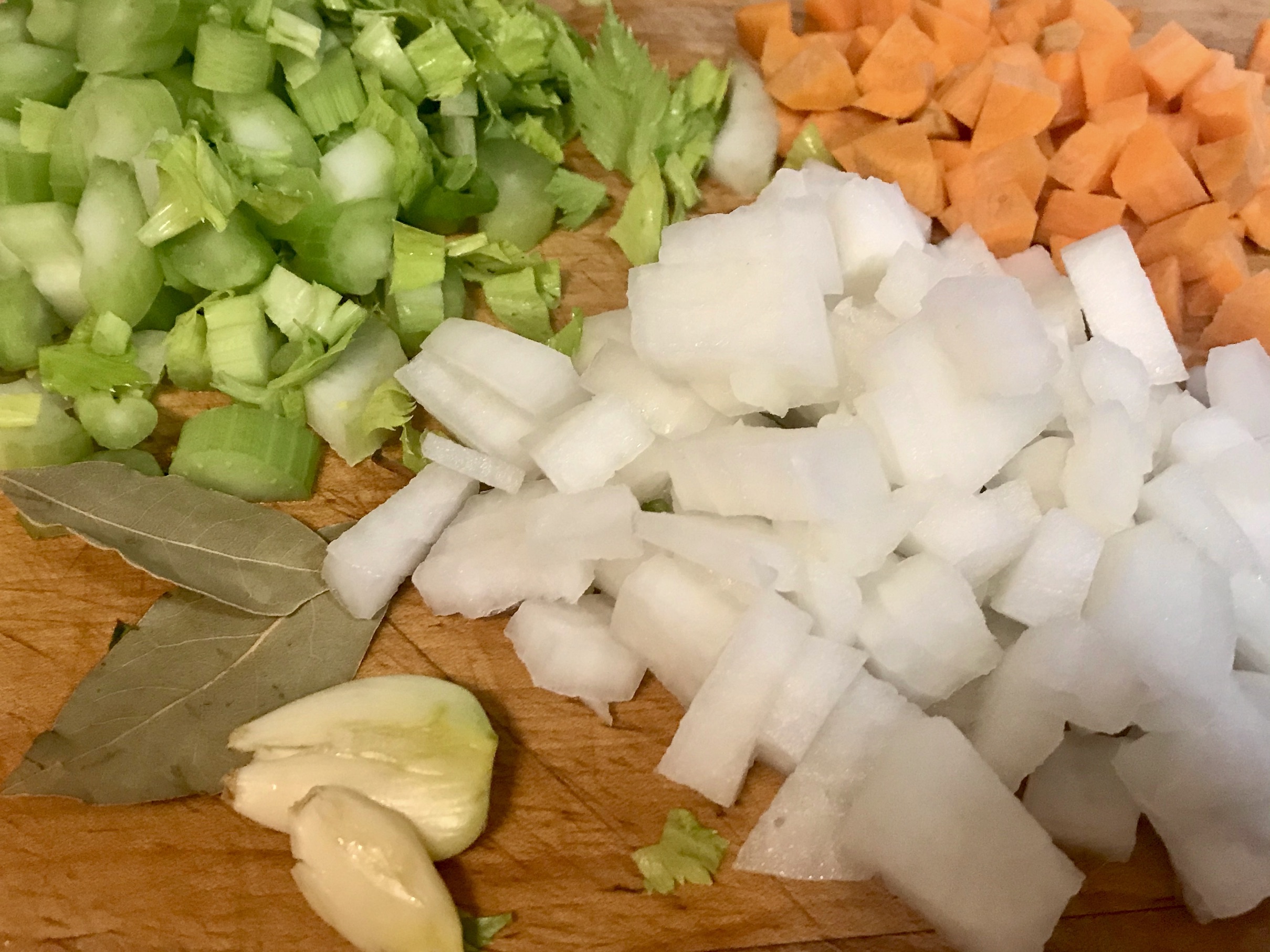 Carrot, Celery, Onion, Garlic & Bay Leaves ingredients for Split Pea Soup