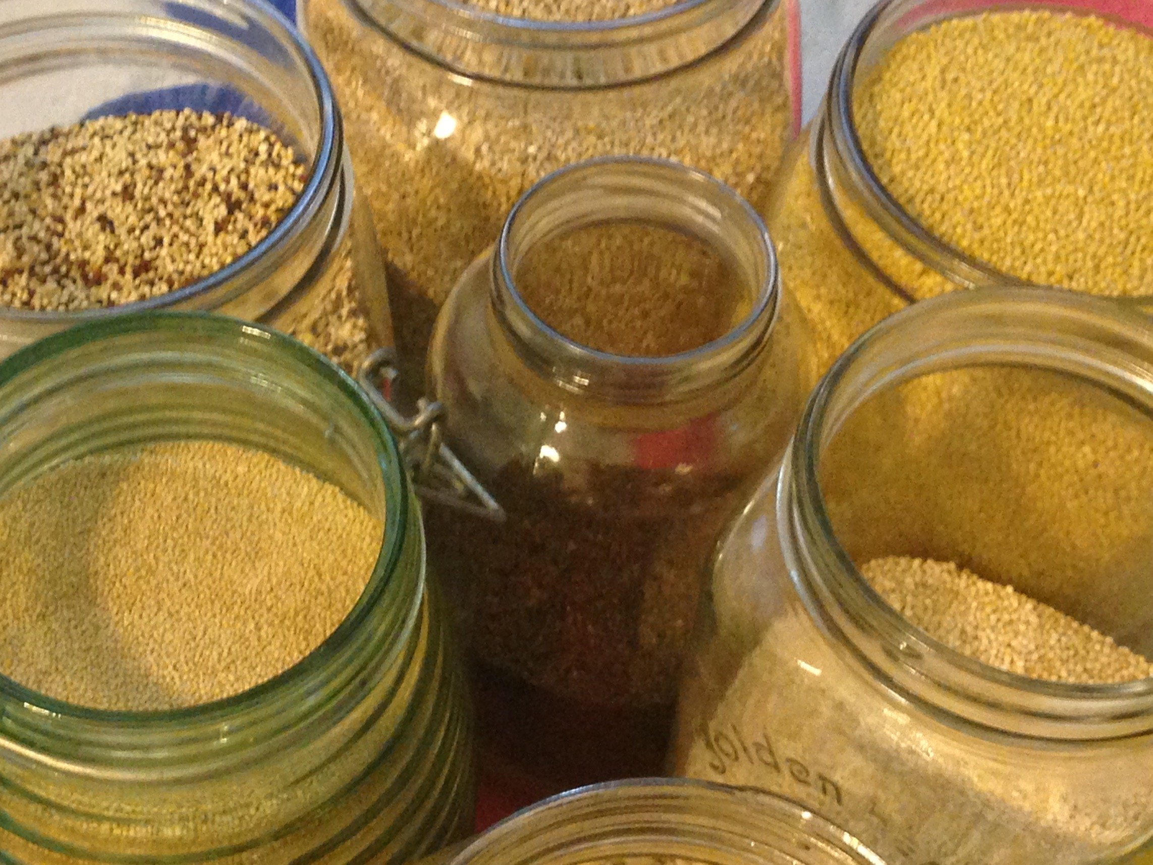 Variety of whole grains in jars